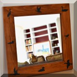 DM05. Wooden framed wirror with bird silhouettes. 
